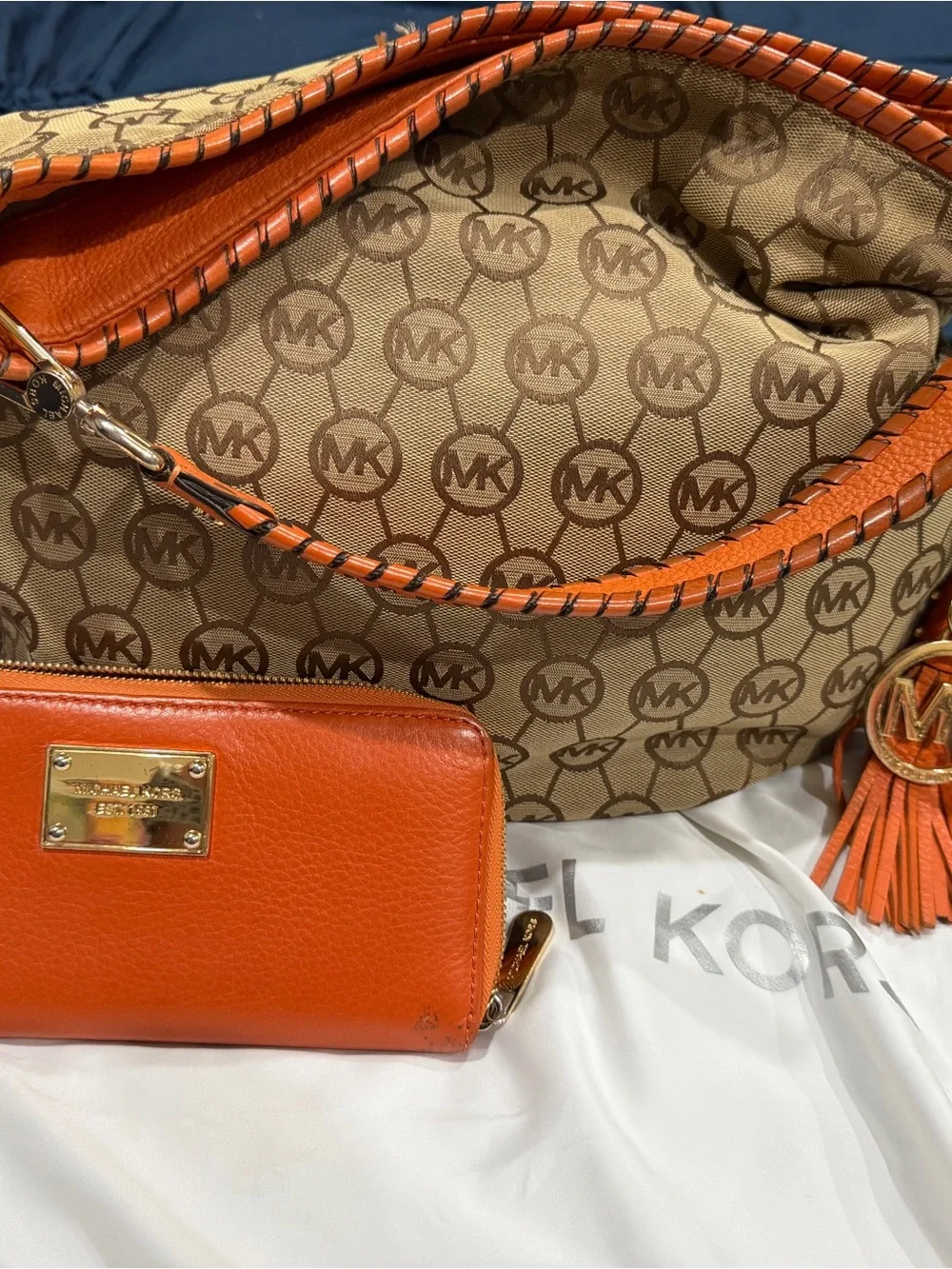 Michael Kors Orange MK Monogram Shoulder Bag with Tassel Charm